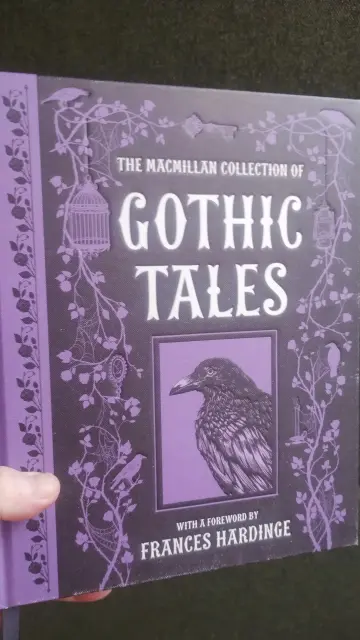 Large hardback of the Macmillan Collection of Gothic Tales for younger readers, a purple coloured cover with a raven on the front